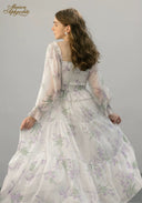 Floral tiered midi dress with ruched bodice and flowing gathered skirt