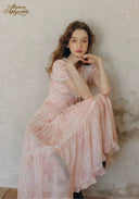 Rose pink ruffled dress with lace-trimmed bodice and gathered tiered skirt