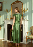 Green satin long dress with lace V yoke and short puff sleeves, draped skirt and waist tie