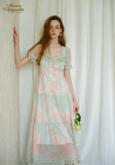 Pastel floral tiered midi dress with puff sleeves and lace hem
