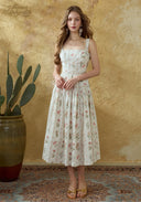 Floral printed cotton suspender midi dress with fitted waist and tiered skirt