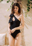 Black one-shoulder swimsuit with bow at neckline and high-cut leg