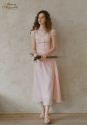 Pale pink dotted midi dress with ruffled cap sleeves and lace front detail