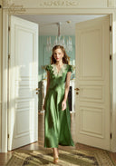 Green satin long dress with lace-trim V neckline and short puff sleeves, fitted bodice