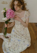 Floral tea dress, cream with scattered blue and pink flowers, lace-trim bodice