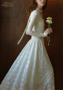 White long-sleeve ballet dress with square neckline and layered lace skirt