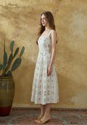 Floral printed cotton suspender dress in a sleeveless square neck silhouette