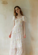 Floral tiered midi dress with puff sleeves and square neckline, gathered ruffles