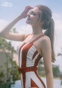 Orange and white striped halter one-piece swimsuit, front view