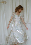 Floral French dress: light white, pastel print, puff sleeves, gathered waist, full skirt