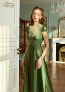 Green satin long dress with lace V neckline, puff sleeves, buttoned front details and full length