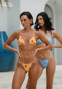 Blue gingham bikini set, triangle bra with tie straps and matching side-tie bottoms.