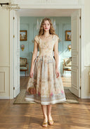 Cream floral printed dress with square neckline, cap sleeves, gathered waist, full skirt