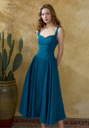 Blue linen suspender dress with buttoned bust shaping and gathered skirt, sleeveless