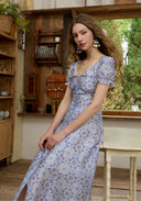 Light blue floral midi dress with puff sleeves and lace-trim square neckline, side front