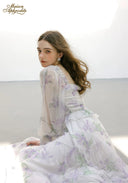 Floral tiered midi dress with square neckline, puff sleeves, and layered skirt