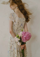 Floral tea dress with puff sleeves and lace-trim neckline detail