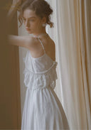 White lace bodice with spaghetti straps and ruffle trim, gathered waist detail