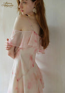 Light pink floral off-shoulder maxi dress with ruffled sleeves and thin straps