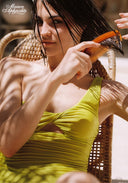 Lime green one-shoulder swimsuit with ruched knot front and high-cut leg