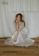 Floral satin midi dress with puff sleeves, gathered waist, tiered skirt hem, silver sheen