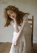 White lace dress, square neckline, puff sleeves, fitted bodice, gathered skirt