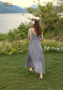 Blue patterned midi dress with lace-trim straps and bow ties at back