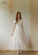 Floral tiered maxi dress with puff sleeves and tiered ruffle hem, cinched waist