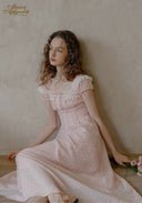 Light pink dotted midi dress, ruffled short sleeves and fitted gathered skirt