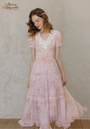 Rose pink tiered lace midi dress with short puff sleeves and lace V neckline, 3/4 view