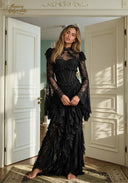 Black lace evening gown with long sleeves, fitted bodice, and tiered ruffle skirt