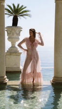 Pink swim set with triangle tie bikini and flowing ruffled sheer cover-up
