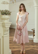 Pink lace midi dress with square neckline and cap sleeves, fitted waist, flared skirt